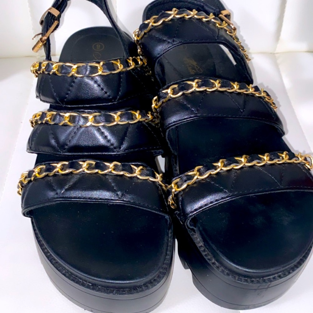 Black and gold wedge sandals